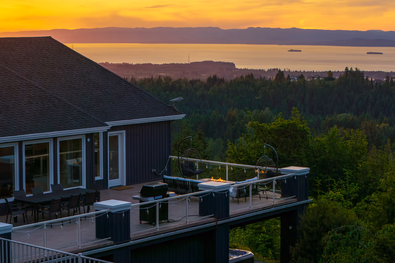 Treat this expansive two-story deck as your private resort, featuring a hot tub, fire pit, and world-class views.
