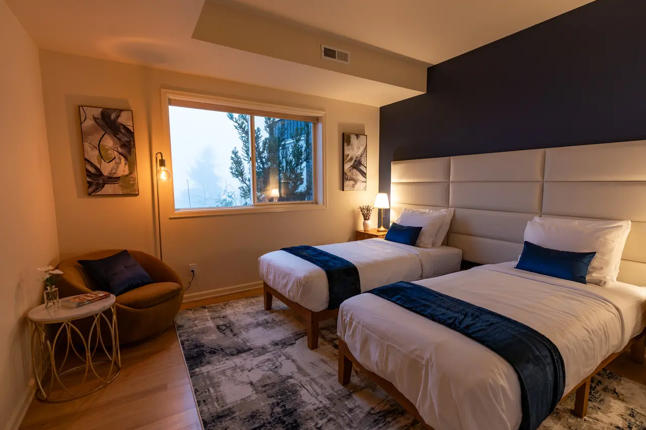 Perfect for friends or family, this room features two comfortable Twin XL beds. 
